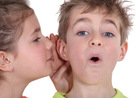 little-girl-telling-brother