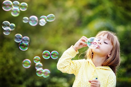 little girl with bubbles